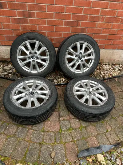 Selling a Set of OEM 16” Mazda 3 Rims On Summer Tires. Tread is low. Bolt Pattern 5x114.3 $379 for S...