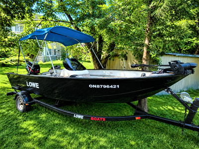 excellent fishing boat with 60hp mercury big foot engine, 70lb minn koda trolling motor, livewell, b...