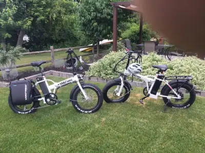 Absolutely everything you will need to enjoy biking this Summer. 2 VOLTBIKE MARINER fat tire e-bikes...
