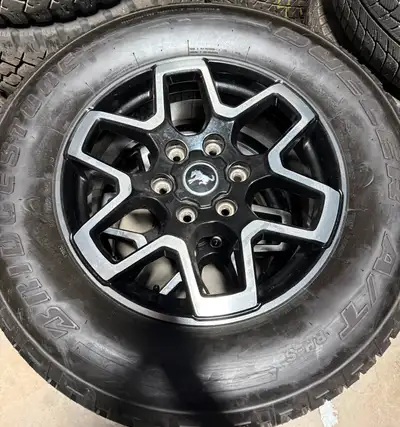 Bridgestone all season 255/70/18 new tires on new take off ford Ranger or bronco wheels or rims with...