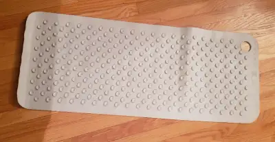 FOR SALE: IKEA DOPPA Bathtub/shower mat 33x84 cm (13x33 ") Light grey, natural rubber Good condition...