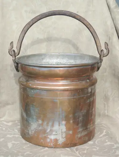 For sale antique copper cauldron/pot Solid copper with wrought iron handle. Leaded inside, remains o...