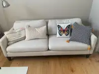 Cream coloured couch 