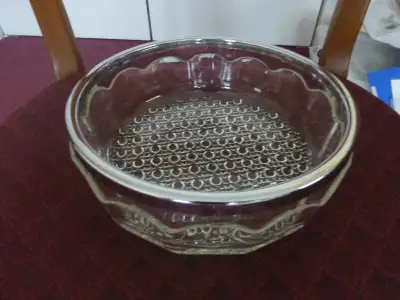 Glass Bowl with chrome plated rim - great for serving potatoes, vegetables or even fruit or a trifle...