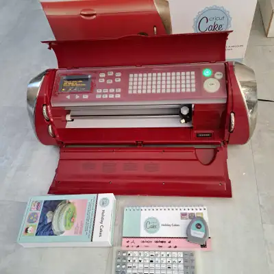 Cricut cake machine with one cartridge dont have the mat $60