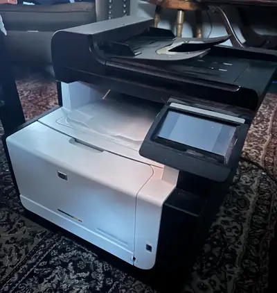 I'm selling an HP LaserJet Pro CM1415nw colour MFP printer. This printer is a colour multi-function...