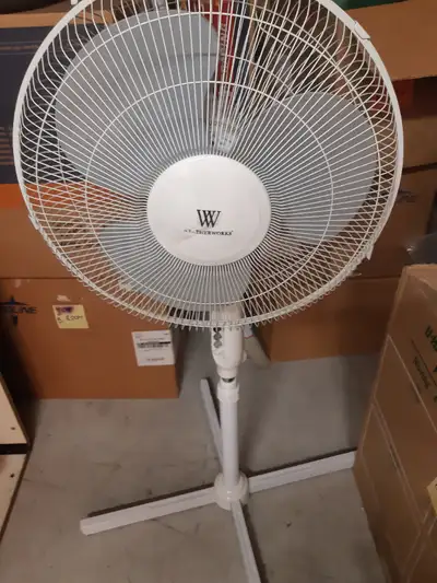 Selling white oscillating stand fan, 17 inches. Has adjustable height and 3 speeds.