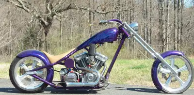 Bike is 120 inches long. Has 124 cubic inch S&S super sidewinder. Baker 6 speed. 3 inch open primary...