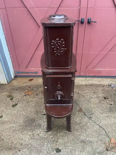 Beautiful brown enamel stove with cooking surface Made in Denmark 41” high 13” wide 23” deep Has had...