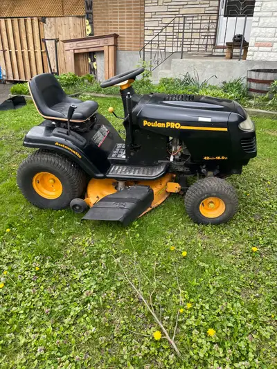 Poulan 18.5 hp runs great brand new battery solenoid oil change works as it should 700$$$ located in...