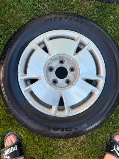 Like new tires on stock civic rims. Only on car for a few months, bought new last summer. 195/65R15...