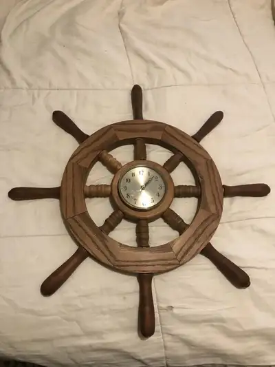 Really cool handmade Ship Wheel Clock! Not mass produced garbage. Would look really cool in a bar or...