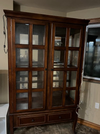 Antique mahogany  cabinet with glass doors 