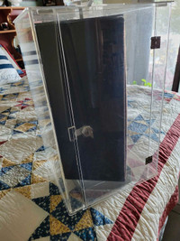 Display cabinet with lock and turn handle