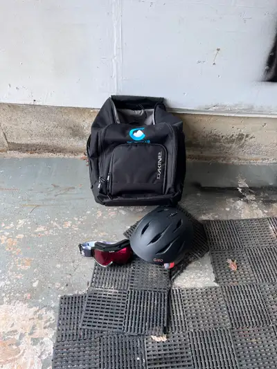 Dakine ski bag, Giro helmet, and Bollé goggles