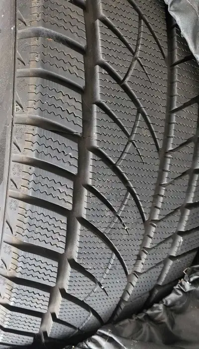 Like new winter tires 235/45R18 Only driven couple hundred kms Bought new car and these don't fit