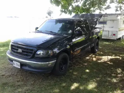 Hi I am selling a 1999 F150 extended cab truck 2wd short box , new intake ,exhaust and manifolds sou...