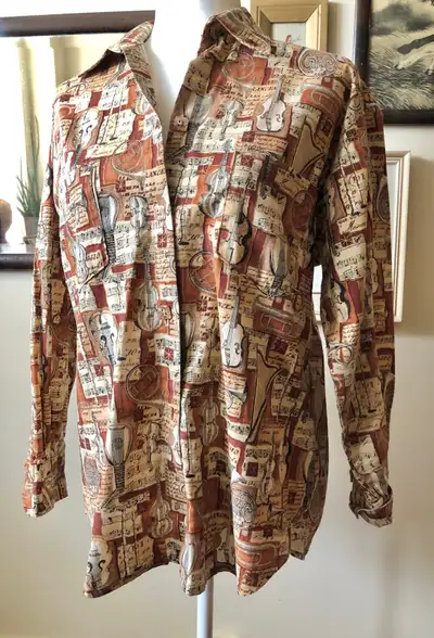 Beautiful instrument pattern. Handmade medium sized long sleeve shirt. Excellent condition. Approxim...
