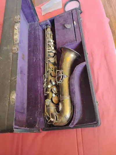 C. G. Conn 1922 or 23 c Melody Saxophone complete with original case Not used in over 50 plus years....