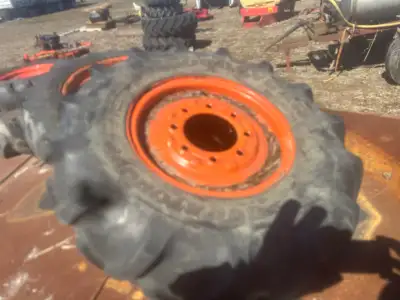 Goodyear tires with Kubota 8 bolt hd rims with lots of wear left. came from M7040 tractor