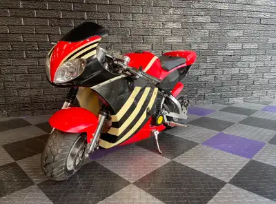 49cc X7 Cateye 2 Stroke automatic Super Pocket Bike. Very hard to find in such good shape. Turn key...