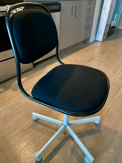 Black swivel office chair , View more