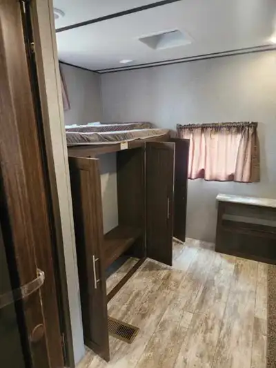 Bought new in 2020, 2 years remaining on warranty. 37 foot travel trailer, sleeps 10, 3 slides, outd...