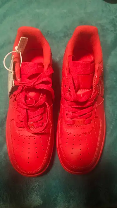 Air Force 1 sneakers. Completely red colourway. Matching red laces. Perforated toe box. Tag still at...