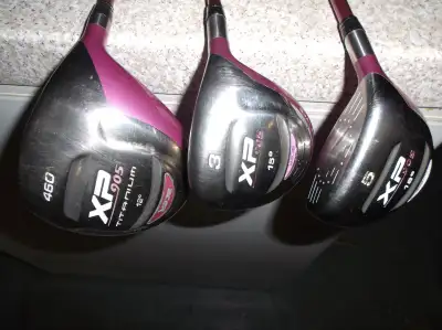Womens' ACER XP 905 12 deg. driver with 15 deg. 3 wood and 18 deg. 5 wood. Clubs have a "beveled-cut...