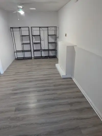 X-Large private room in a walk out basement for rent.