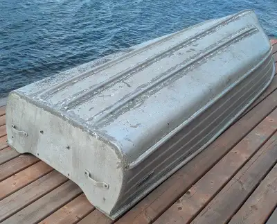 12 Foot Simpson Sears Aluminum Boat. Model 1205Y. This boat is 4 feet wide and leaks somewhat. It ca...