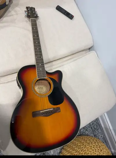 Mitchell acoustic-electric guitar with soft case , View more