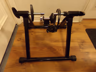 BRAND NEW , 8 REMOTELY CONTROLLED ADJUSTABLE RESISTANCE LEVELS , ALL METAL FOLDING , MAGNETIC BIKE T...