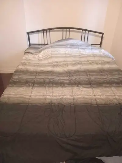Nearly new queen size bed frame and mattress