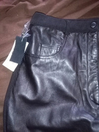 Ladies black leather pants size large brand new never worn$20 ea