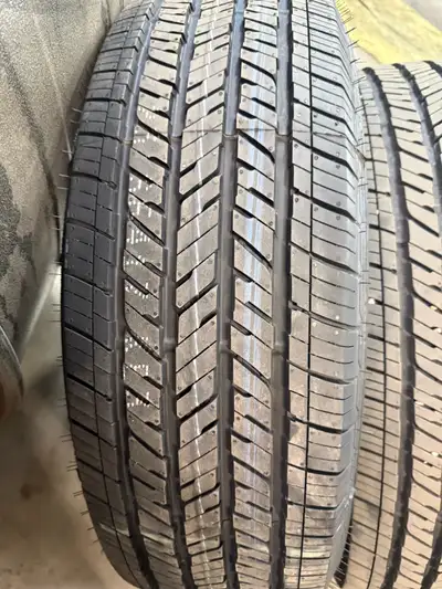 Set of 5 255/70R18 Bridgestone Dueler H/T tires off of a brand new Jeep Wrangler. 4 with around 500k...
