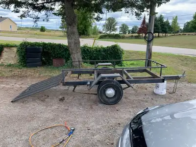 Home built. 95-1/2” x 45-1/2”. Needs lights and wire. 1-7/8” coupler. Tires are not mint. Trailer co...