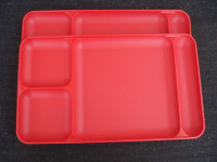 2 red Tupperware trays