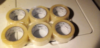 Large rolls of packing tape . packages of 6 rolls each