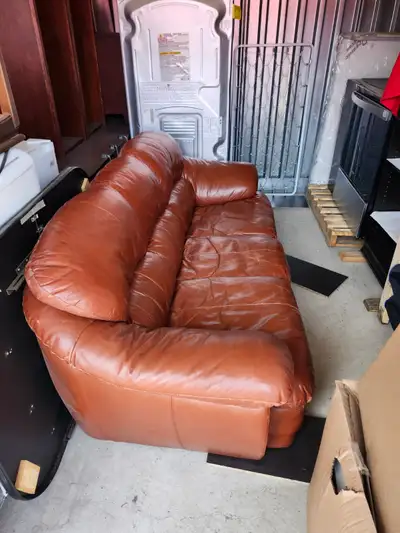 Free leather sofa. Some wear but good condition. 84 inches long