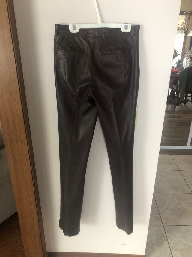 Size 8 Danier leather boot cut chestnut brown pants in Women's - Bottoms in Winnipeg