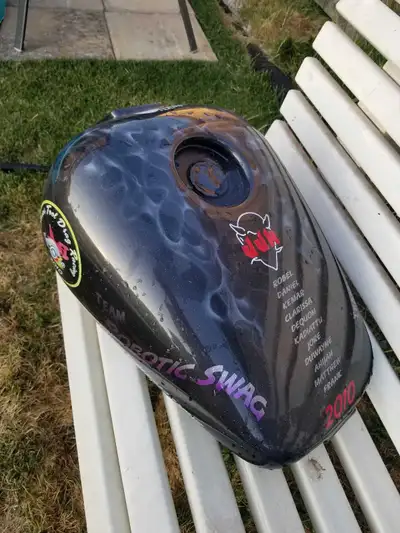 I'm selling a used custom motorcycle gas tank. This tank is sporting a unique custom paint job. It c...