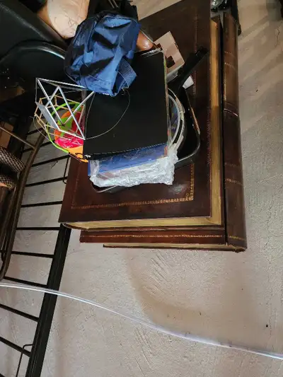Selling a unique, vintage-style decorative wooden accent table designed to look like a classic leath...
