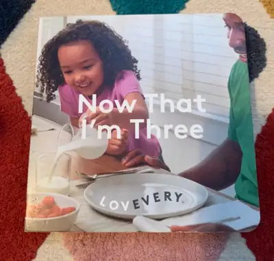 Lovevery Board Book Now That I'm Three It is a sturdy and beautifully illustrated book that celebrat...