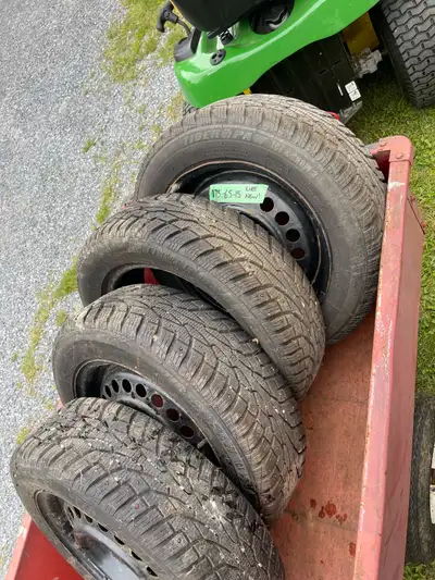 Like new Uniroyal Tigerpaw 175-65-15 studded winters on Honda rims (3 only).