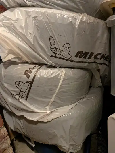 4 Lightly used Michelin winter tires. (205/50R17) Tread depth measured by a mechanic: 2 at 7/32, and...