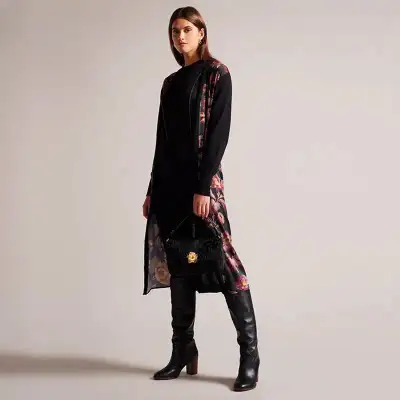 New with tag Size 1, US size S floral print makes a vivid statement on a versatile longline cardigan...