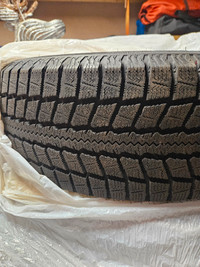 1 season old snow tires in excellent condition