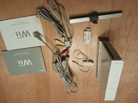 Nintendo Wii console, 2 manettes, 2 nunchucks et 11 jeux