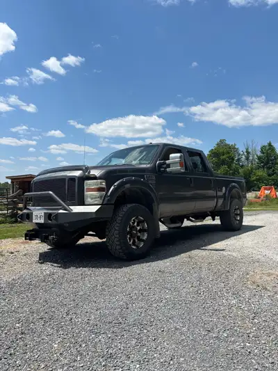 6.4 diesel, runs amazing, second owner, heavy duty coil up front, air bags with on board compressor,...
